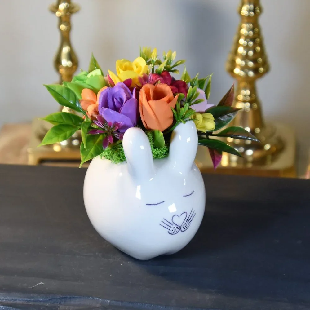 Cute small bunny rabbit planter filled small Sola flowers dyed in bright colors